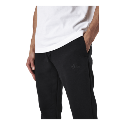 Essentials Tapered Cuff Logo Pants Black / White